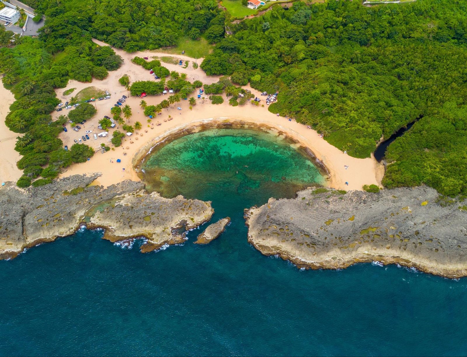 Mar Chiquita — a natural pool carved by limestone formations.